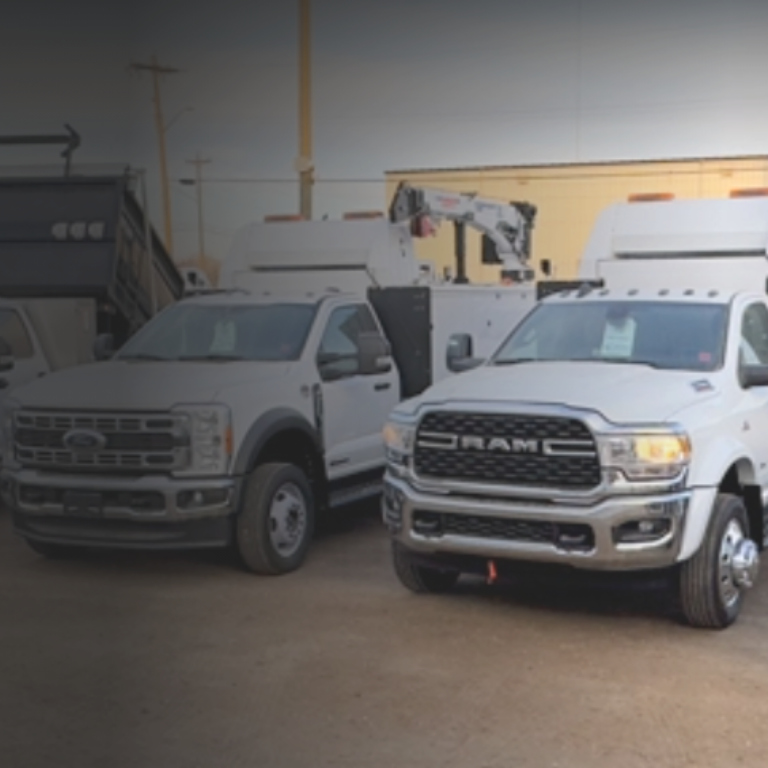 White ram trucks parked