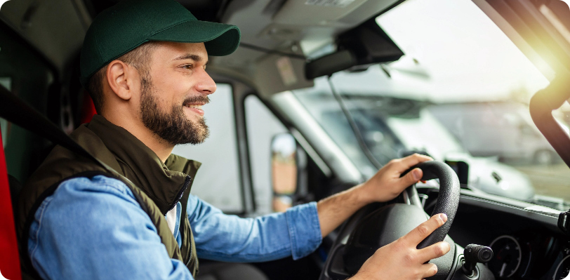 Young man driving truck